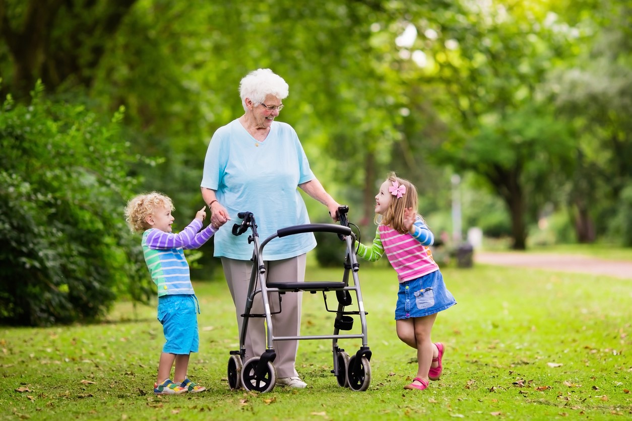 Lady with walker and children