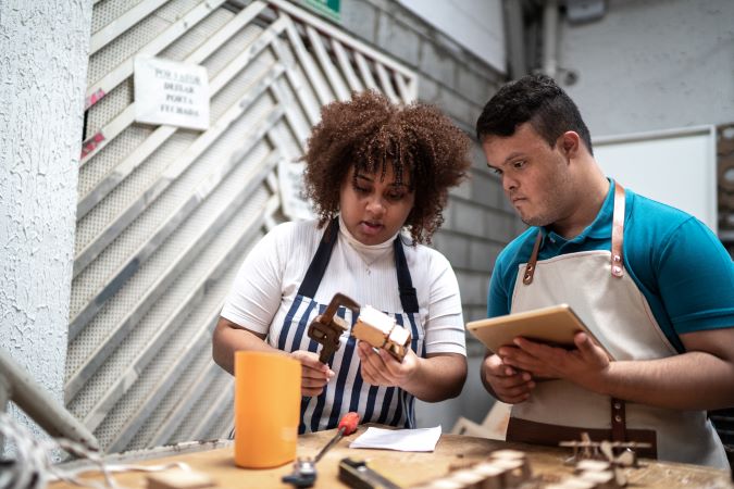woman and man work together 