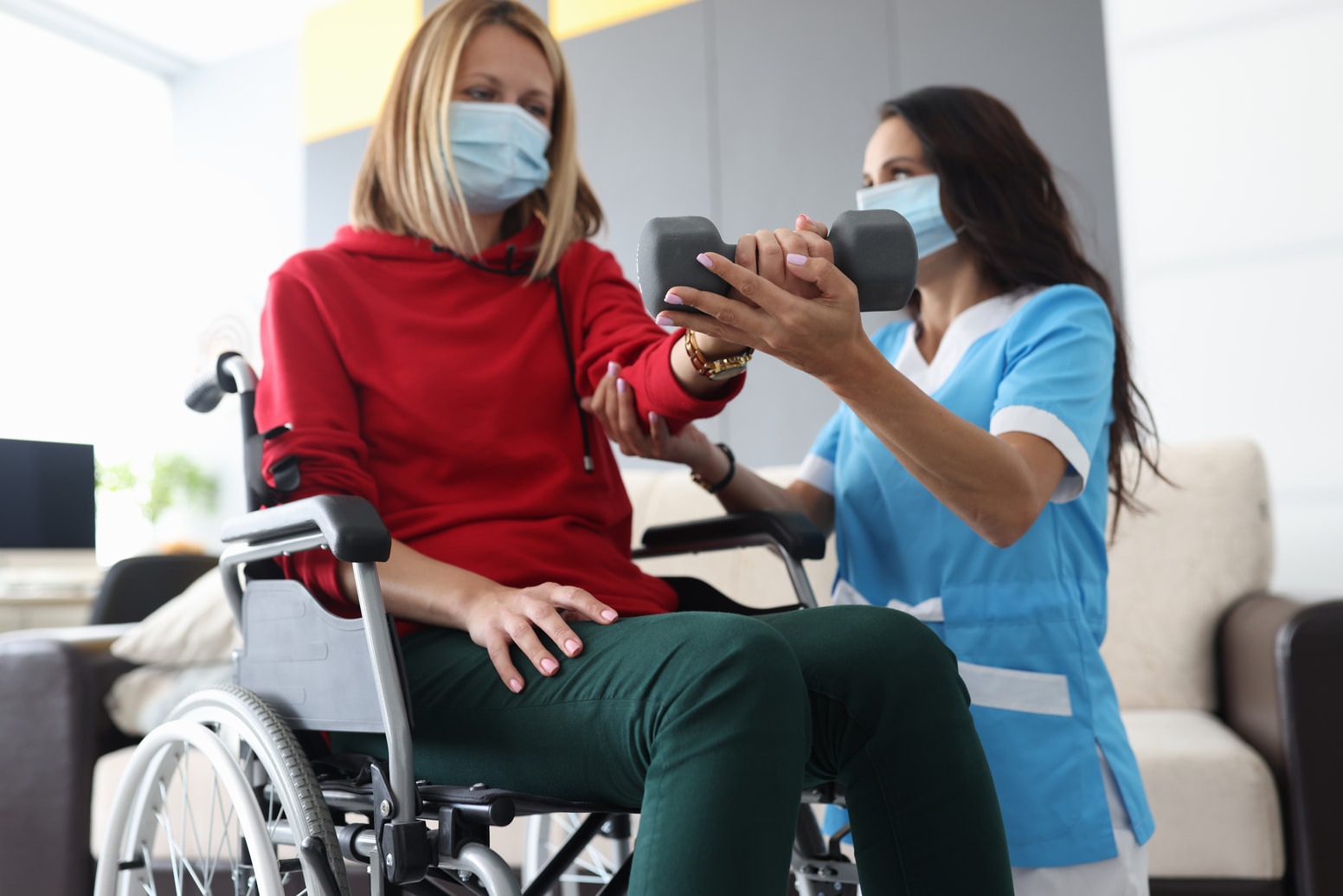 Nurse speaking with senior woman