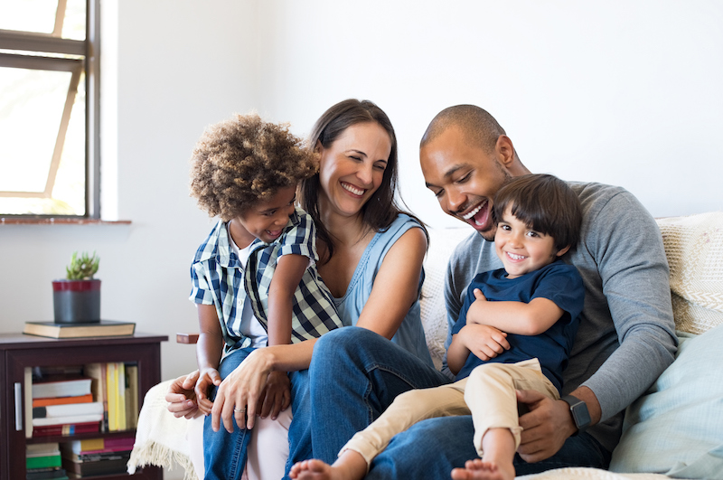 A family with father, mother and two children.