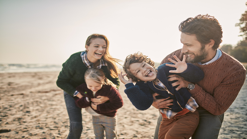 A happy family on the beach. 